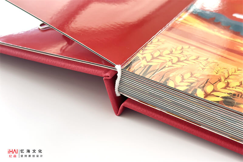 蝴蝶对裱精装的今麦郎31周年企业纪念册内页装订-忆海文化